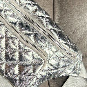 ah.dorned New York, waist or across the body bag, Silver Color.